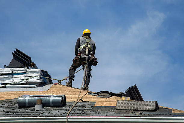 Professional Metal Roofing technician working in Bandon, OR